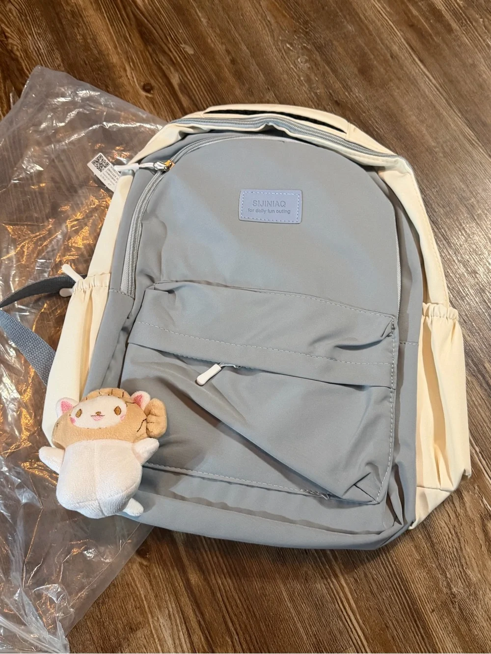 Light Gray Canvas Backpack with Cream Sides
